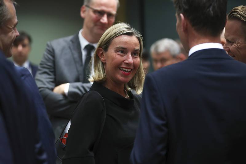 European Union foreign policy chief Federica Mogherini, center, arrives for a European Foreign Affairs Ministers meeting at the European Council headquarters in Brussels, Monday, July 15, 2019.