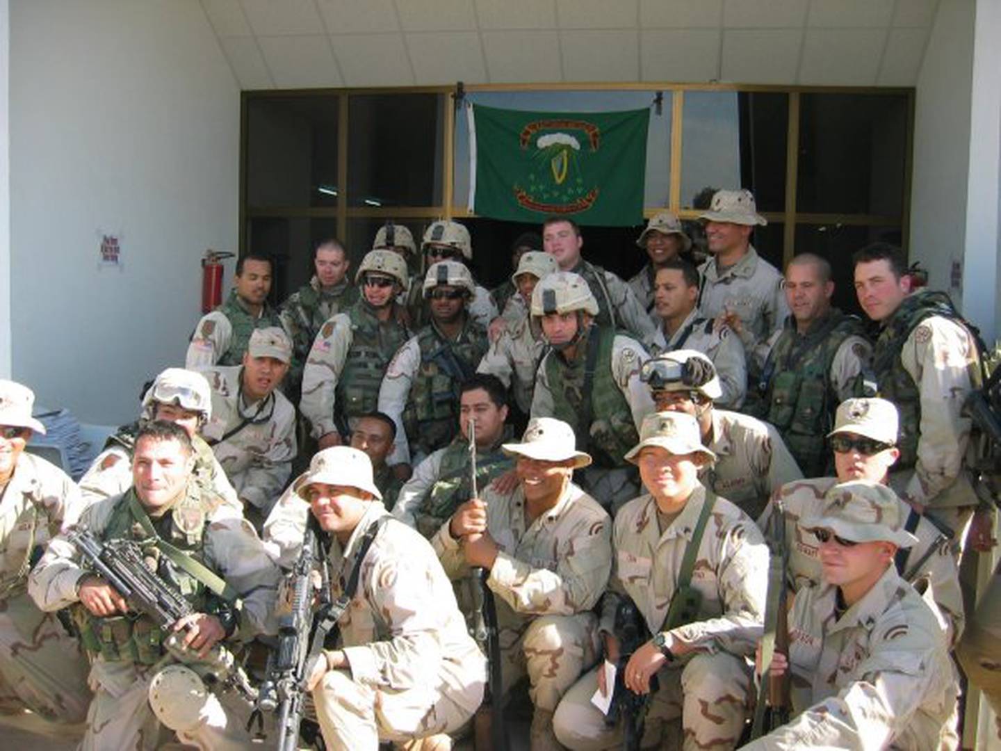 Combined New York Army National Guard unit at a memorial service for two New York soldiers who were killed in action, Baghdad, Iraq, December 2004.