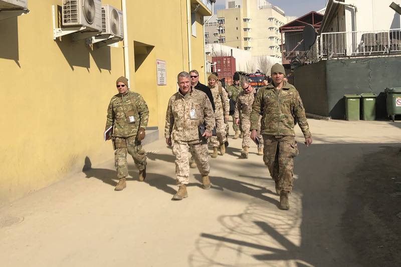 Marine Gen. Frank McKenzie, center, the top U.S. commander for the Middle East, makes an unannounced visit Jan. 31, 2020 in Kabul, Afghanistan.