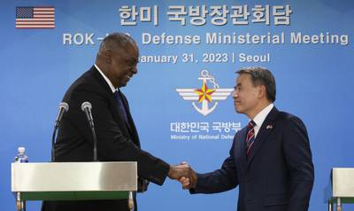 U.S. Secretary of Defense Lloyd Austin, left, shakes hands with South Korean Defense Minister Lee Jong-sup after a joint press conference after their meeting at the Defense Ministry in Seoul, South Korea, Tuesday, Jan. 31, 2023.