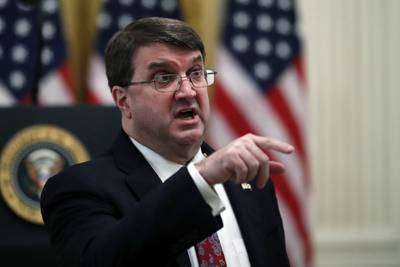 Veterans Affairs Secretary Robert Wilkie talks before President Donald Trump arrives to speak about protecting seniors, in the East Room of the White House, Thursday, April 30, 2020, in Washington.