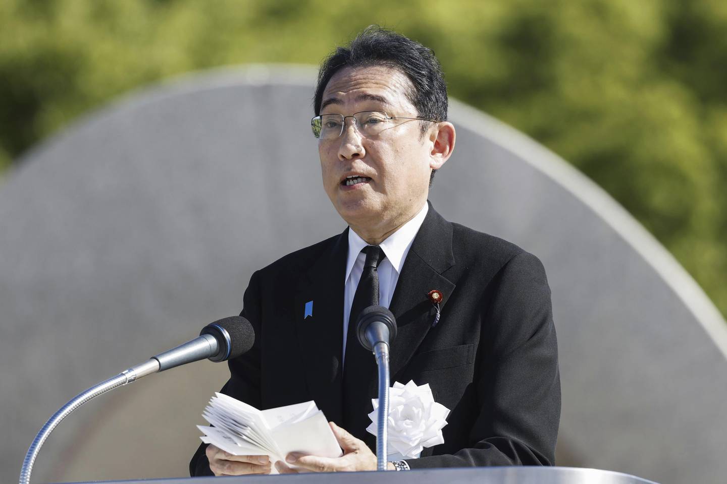 Japan's Prime Minister Fumio Kishida delivers a speech during a ceremony marking the 78th anniversary of the world's first atomic bombing at the Hiroshima Peace Memorial Park in Hiroshima, western Japan Sunday, Aug. 6, 2023.