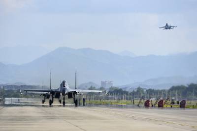 air force and naval aviation corps of the Eastern Theater Command of the Chinese People's Liberation Army fly planes at an unspecified location in China, Aug. 4, 2022.
