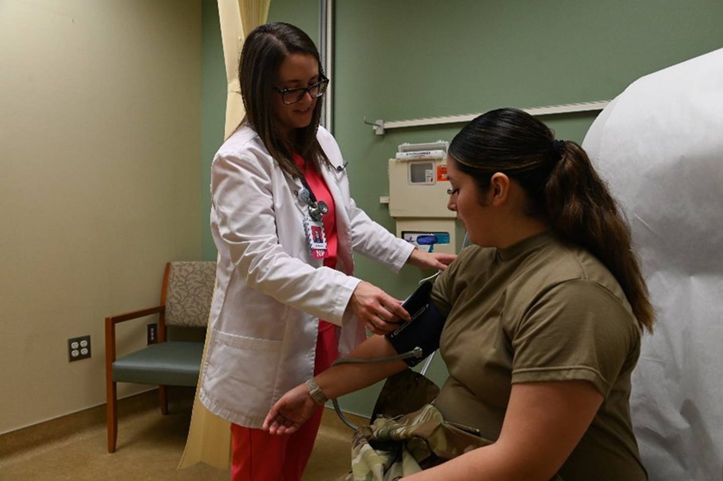 Mackenzie Turner, 30th Medical Group women’s health clinic nurse practitioner, conducts a regular patient check-up for U.S. Air Force Senior Airman Cinthia Cortes, 30th MDG medical technician, Sept. 27, 2023, at Vandenberg Space Force Base, Calif.