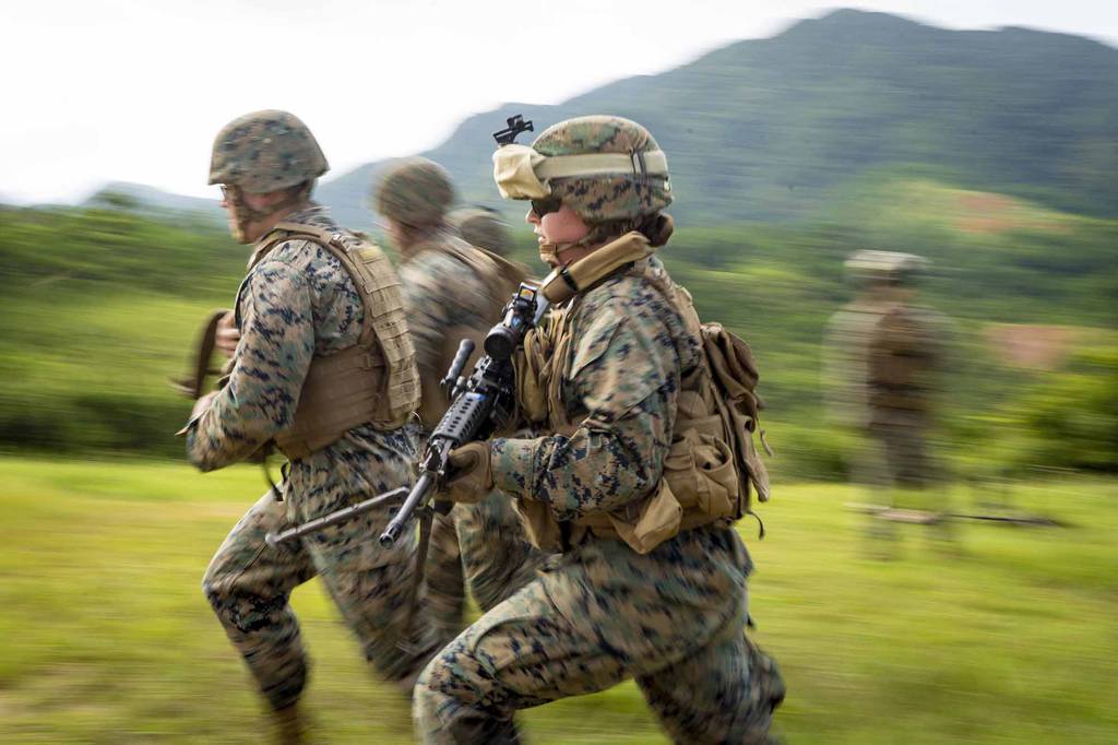 Marine Corps Lance Cpl. Mackenzie K. Price participates in a gun run during a training and readiness event on Range 9, Camp Hansen, Okinawa, Japan, Sept. 30, 2020.