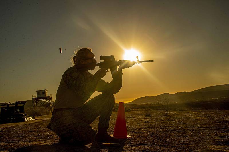 Electrician’s Mate 1st Class Amber Burns fires an M4 carbine rifle Dec. 15, 2020, during a live-fire qualification exercise as part of unit level training at Camp Pendleton, Calif.