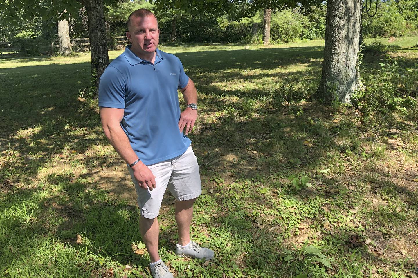In this photo made on July 29, 2020, Bryan Hillberg, stands in his yard in Waynesville, Ohio.