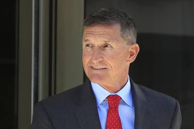 former Trump national security adviser Michael Flynn leaves the federal courthouse in Washington, following a status hearing.