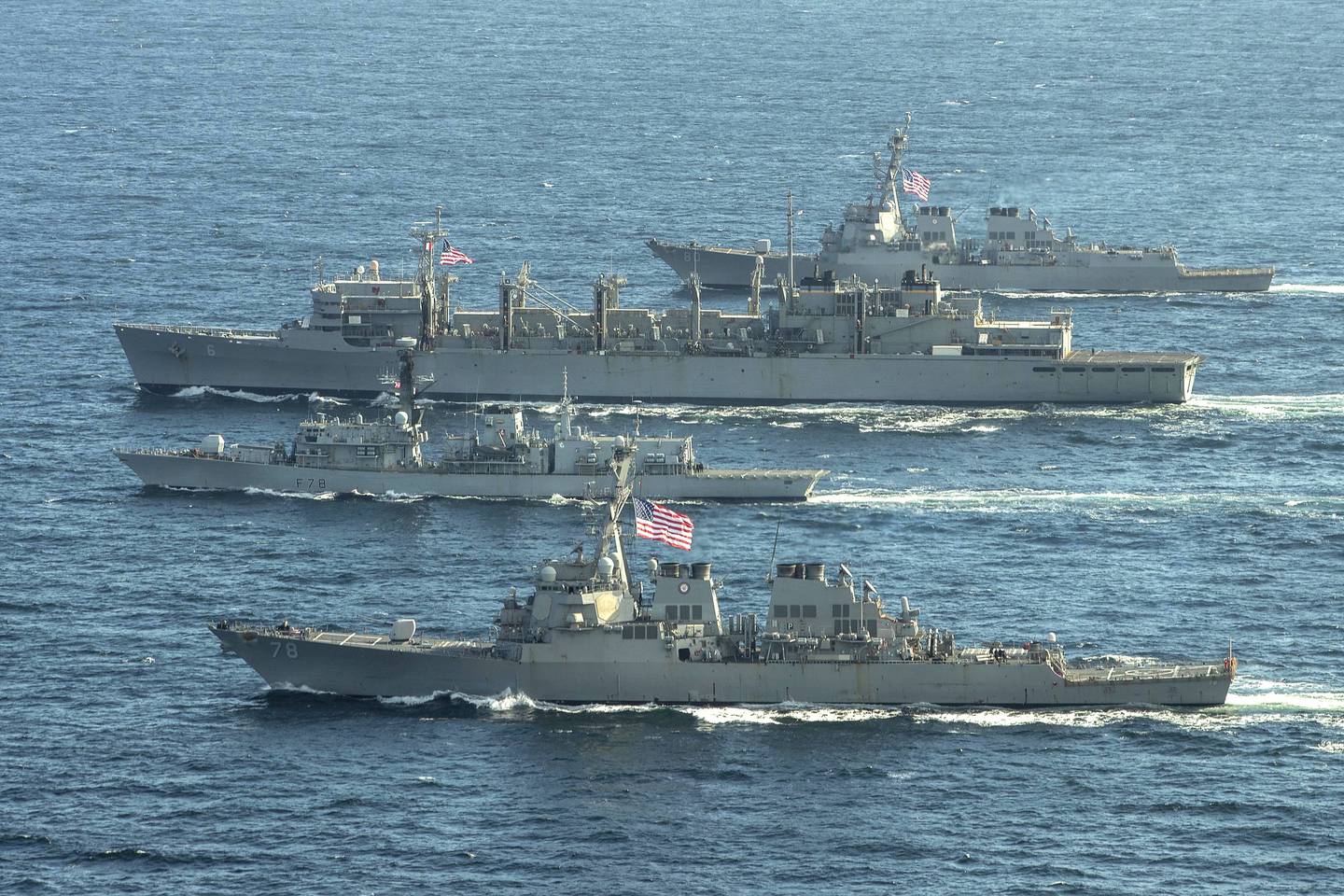 The Arleigh Burke-class guided-missile destroyer USS Porter (DDG 78), front, the Royal Navy Type-23 Duke-class frigate HMS Kent (F78), the fast combat support ship USNS Supply (T-AOE 6) and USS Roosevelt (DDG 80) conduct joint operations to ensure maritime security in the Arctic Ocean, May 5, 2020.