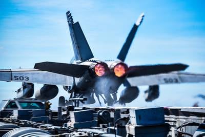 An E/A-18G Growler launches from the flight deck of the aircraft carrier USS Ronald Reagan (CVN 76) on Oct. 23, 2020, in the Philippine Sea.