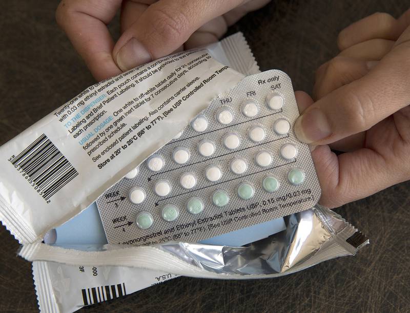 In this Aug. 26, 2016, file photo, a one-month dosage of hormonal birth control pills is displayed in Sacramento, Calif.