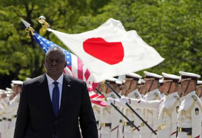 U.S. Defense Secretary Lloyd Austin reviews the guard of honor at the Defense Ministry in Tokyo Thursday, June 1, 2023.