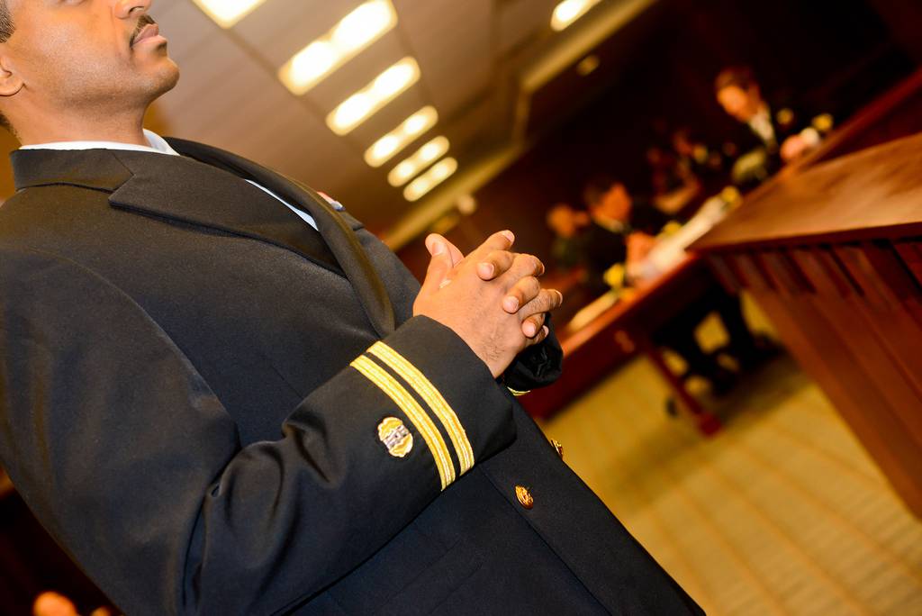 Lt. Christopher Fletcher, a judge advocate, prepares for a court-martial at the Washington Navy Yard in Washington on March 20, 2013.