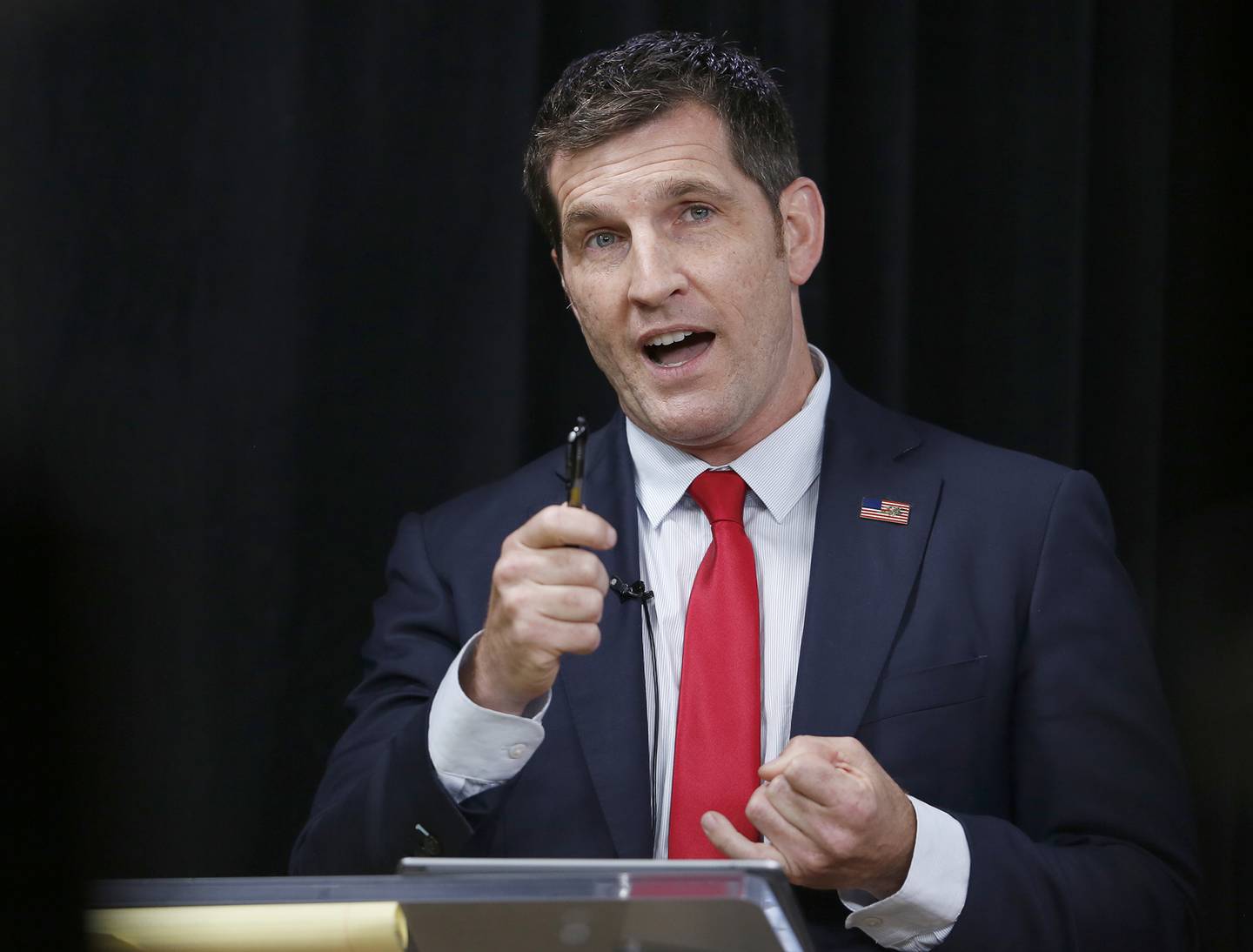 In this Oct. 20, 2020, file photo Republican Scott Taylor answers questions during the 2nd Congressional District debate in Norfolk, Va. Taylor faces Democratic incumbent Rep. Elaine Luria, D-Va.