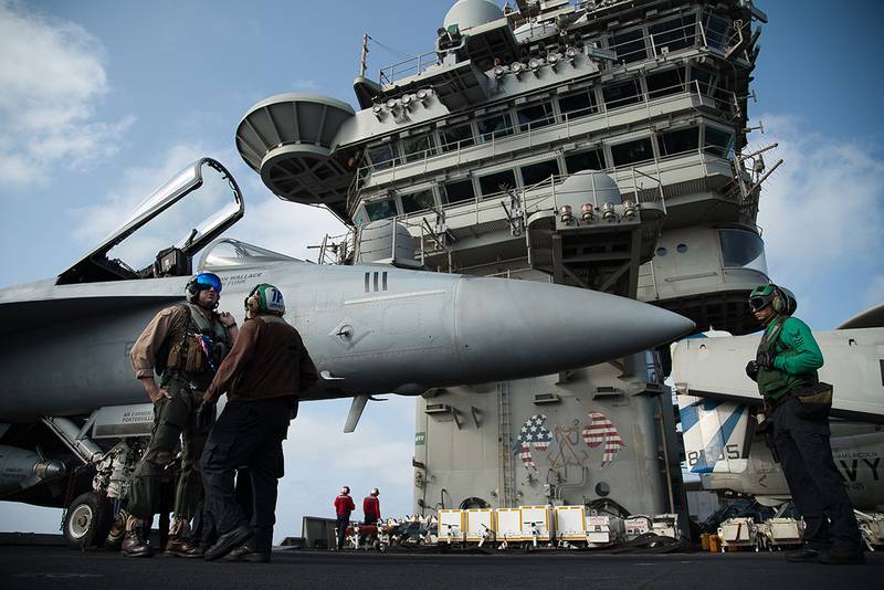 F/A-18 fighter jet on the deck of the USS Abraham Lincoln