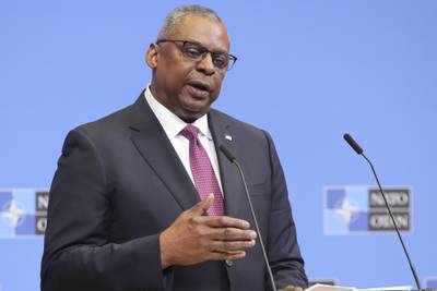 United States Secretary of Defense Lloyd Austin reads a statement following a NATO defense ministers meeting at NATO headquarters in Brussels, Wednesday, Feb. 15, 2023.