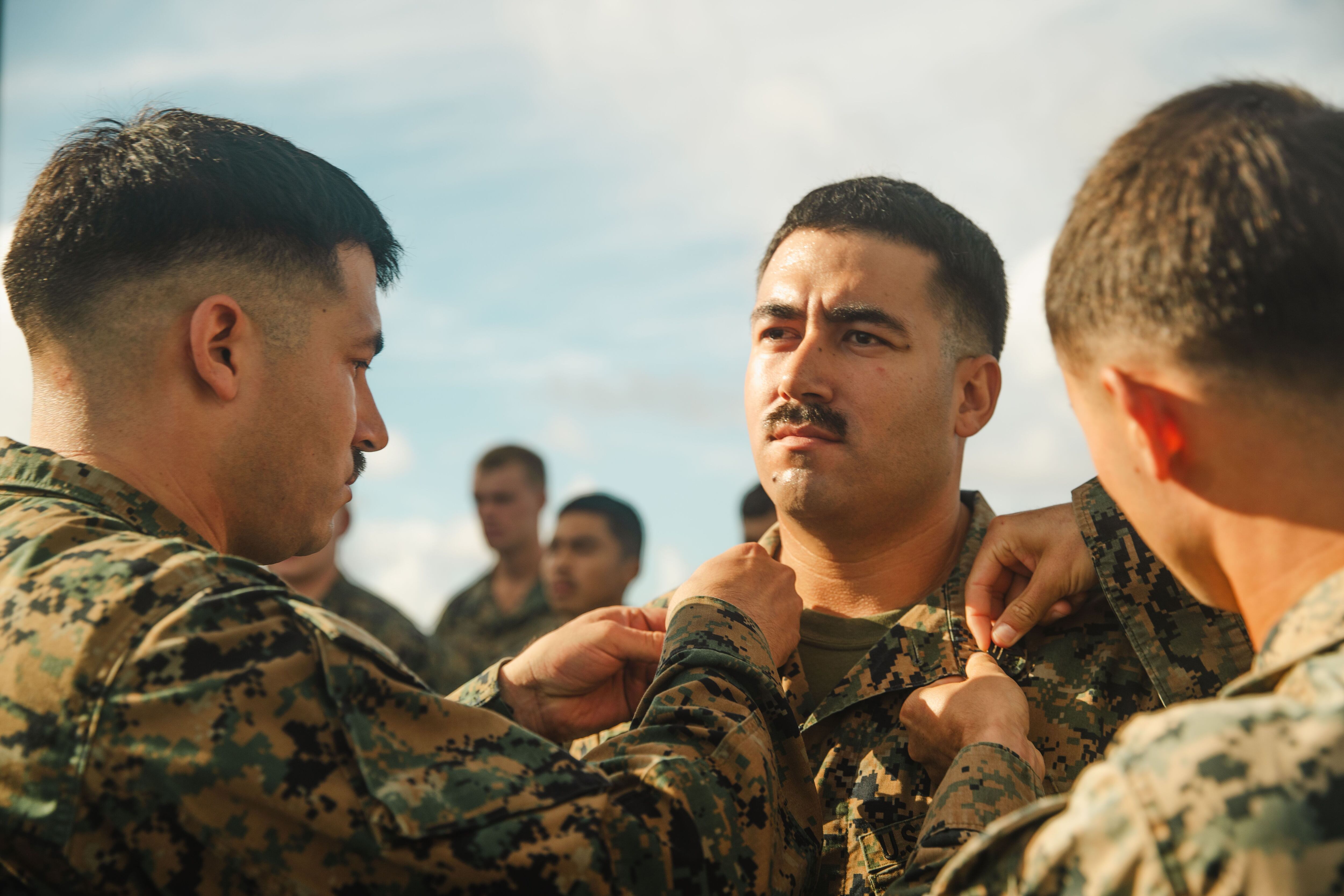 Marine promoted by identical twin brother while deployed with 15th MEU