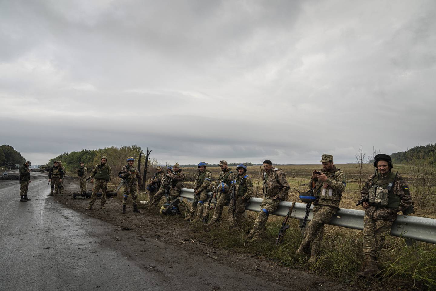 Ukrainian servicemen rest at a former Russian position in the recently retaken area of Izium, Ukraine, Friday, Sept. 16, 2022.