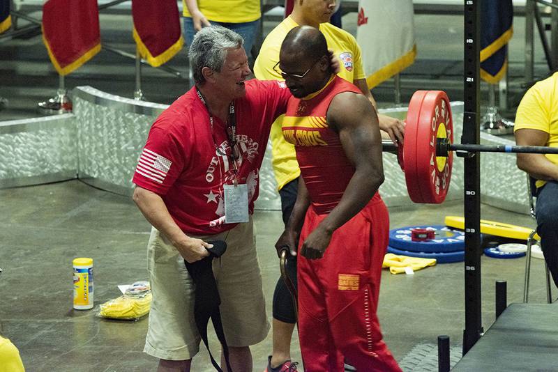 Marine Corps competitor Sgt. Durrell Jones celebrates with his coach after a successful lift during the powerlifting competition at the DoD Warrior Games in Tampa, Fla.