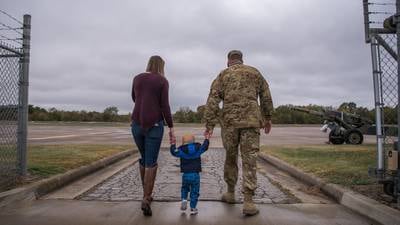 Family and friends welcome soldiers home, Oct. 19, 2020, at Army Aviation Support Facility, Tusla, Okla.
