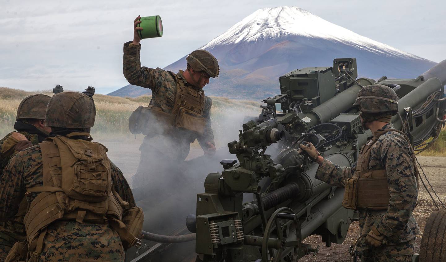 U.S. Marines prepare to fire an M777A2 155mm Howitzer as a part of the Artillery Relocation Training Program 20.3 at Combined Arms Training Center, Camp Fuji, Japan, Oct. 20, 2020.