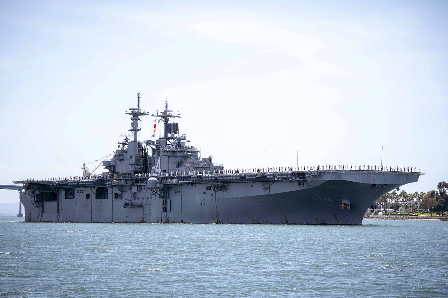 In this May 1, 2019, photo provided by the U.S. Navy, the amphibious assault ship USS Boxer (LHD 4) transits the San Diego Bay in San Diego, Calif.