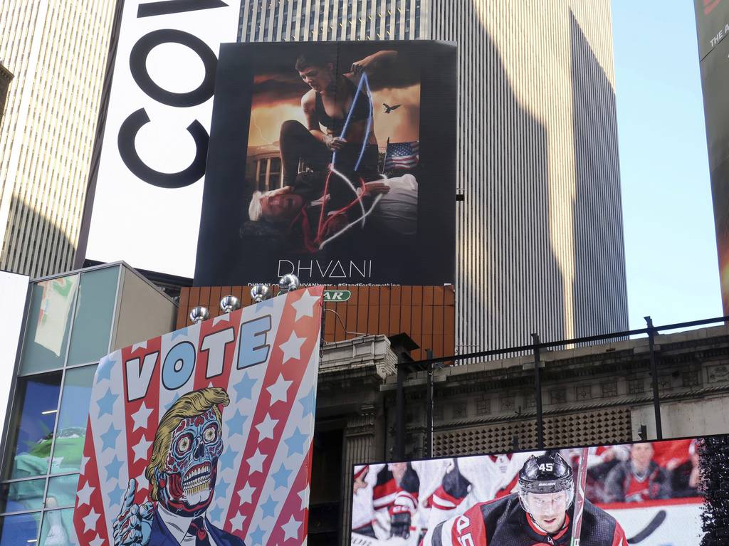 Times Square billboard Trump hogtied