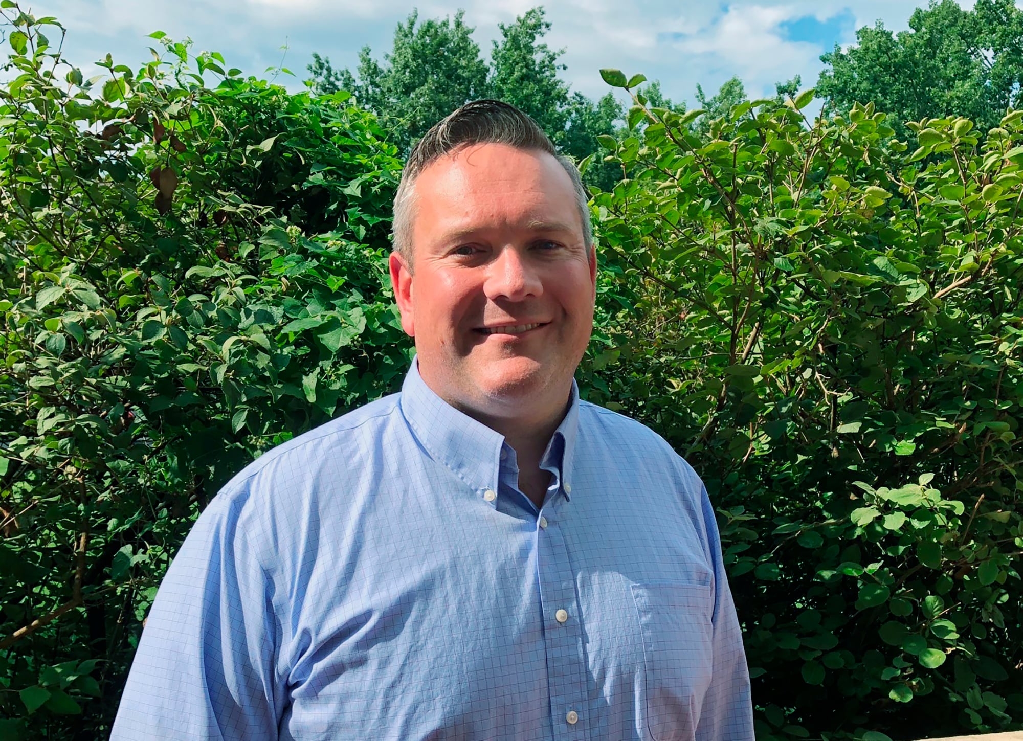 In this July 30, 2019, photo, Marine veteran and Democrat Josh Hicks poses for a photo in Frankfort, Ky.