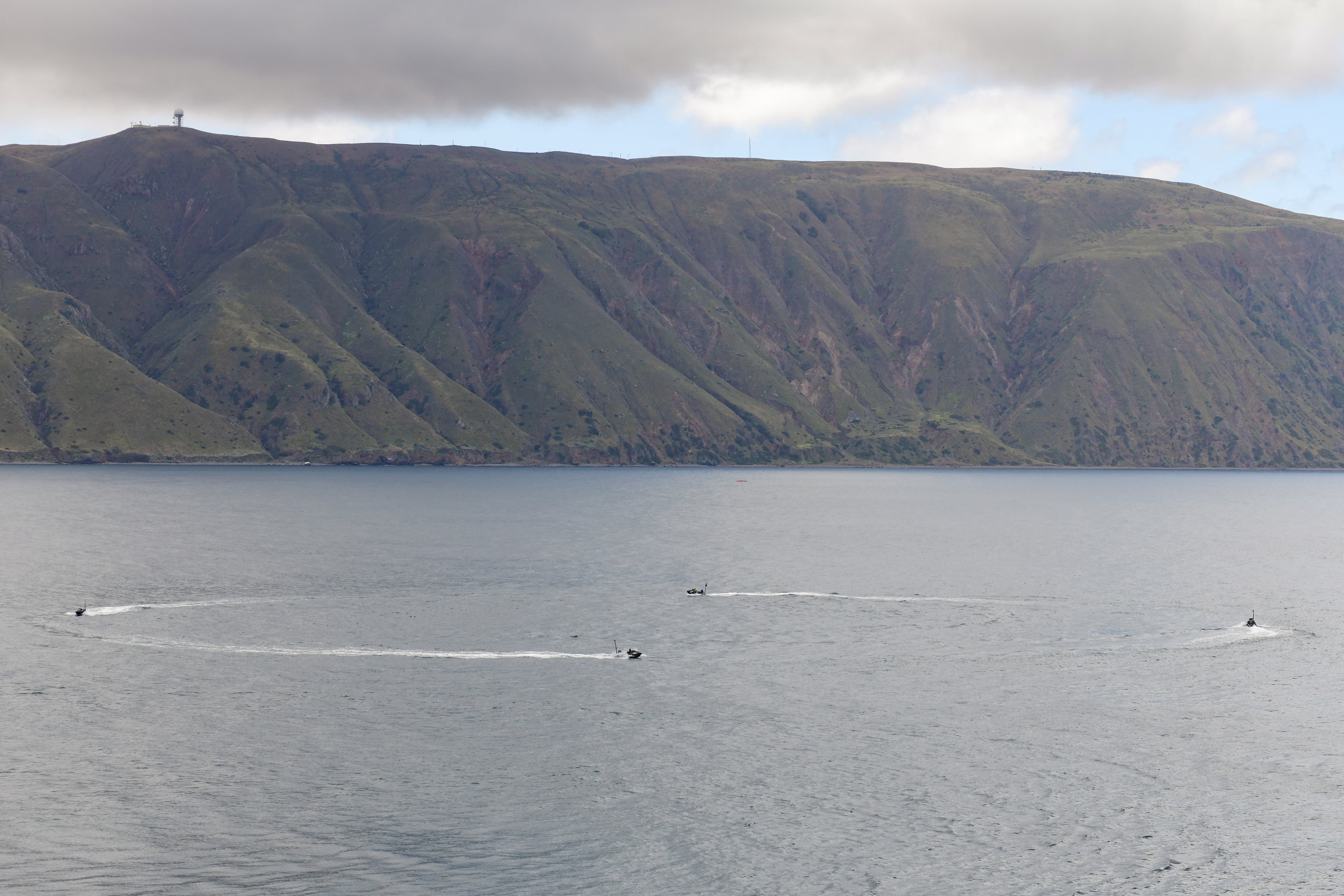 Ship-deployable seaborne targets move in a swarm formation off the coast of San Clemente Island during the U.S. Pacific Fleet’s Integrated Battle Problem exercise. (Mass Communication Specialis