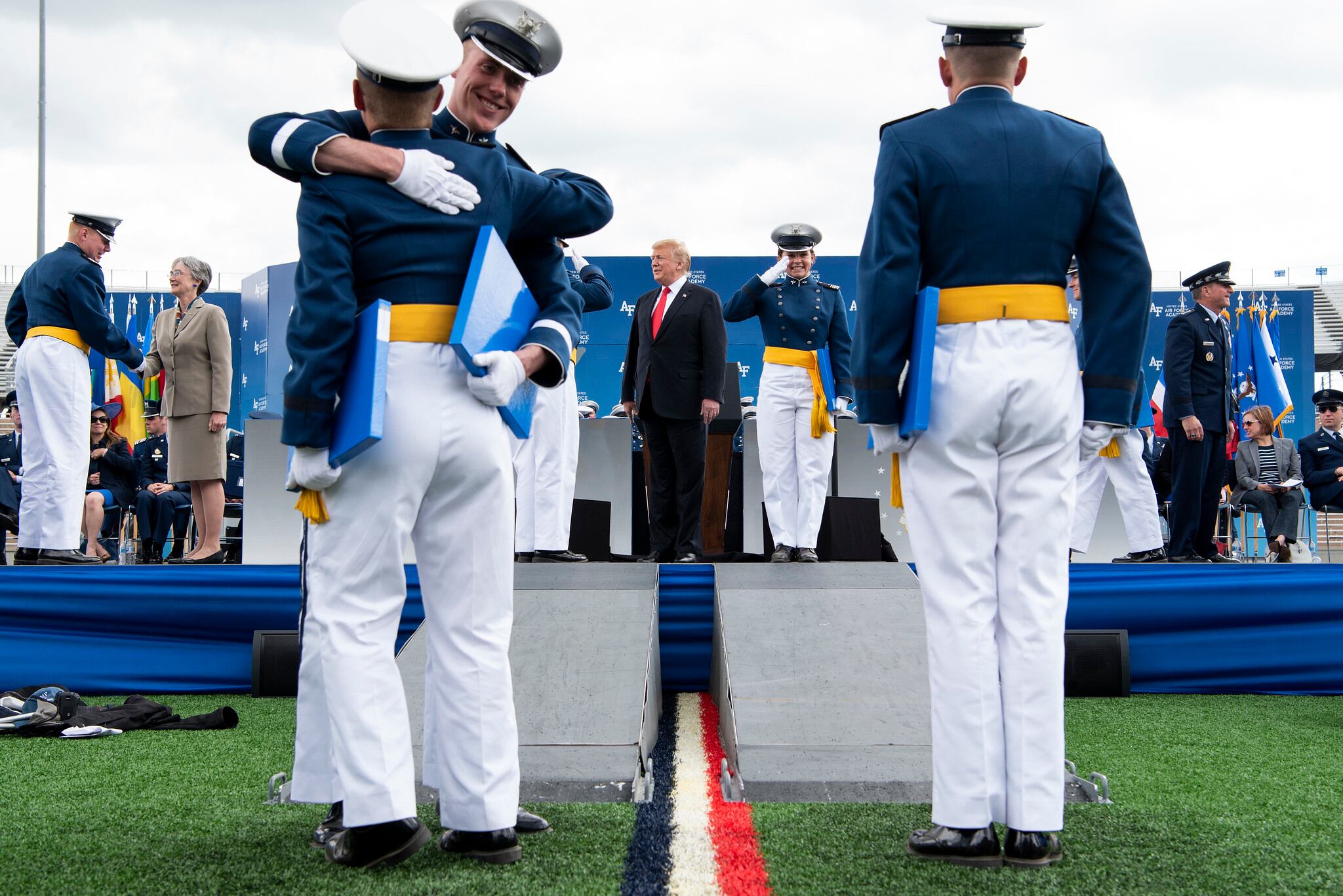 President Donald Trump congratulates cadets at the U.S. Air Force Academy graduation at Falcon Stadium in Colorado Springs, Colo.