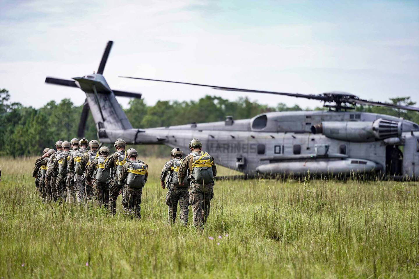 Marines with 3rd Force Reconnaissance Company, 4th Marine Division prepare to static line jump out of a CH-53 Super Stallion during an airborne operations event at Camp Shelby, Miss., Oct. 6, 2020.