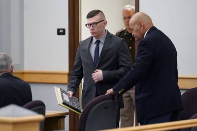 Volodymyr Zhukovskyy enters a courtroom at Coos County Superior Court, in Lancaster, N.H., Monday, July 25, 2022, before a scheduled visit to the crash scene.