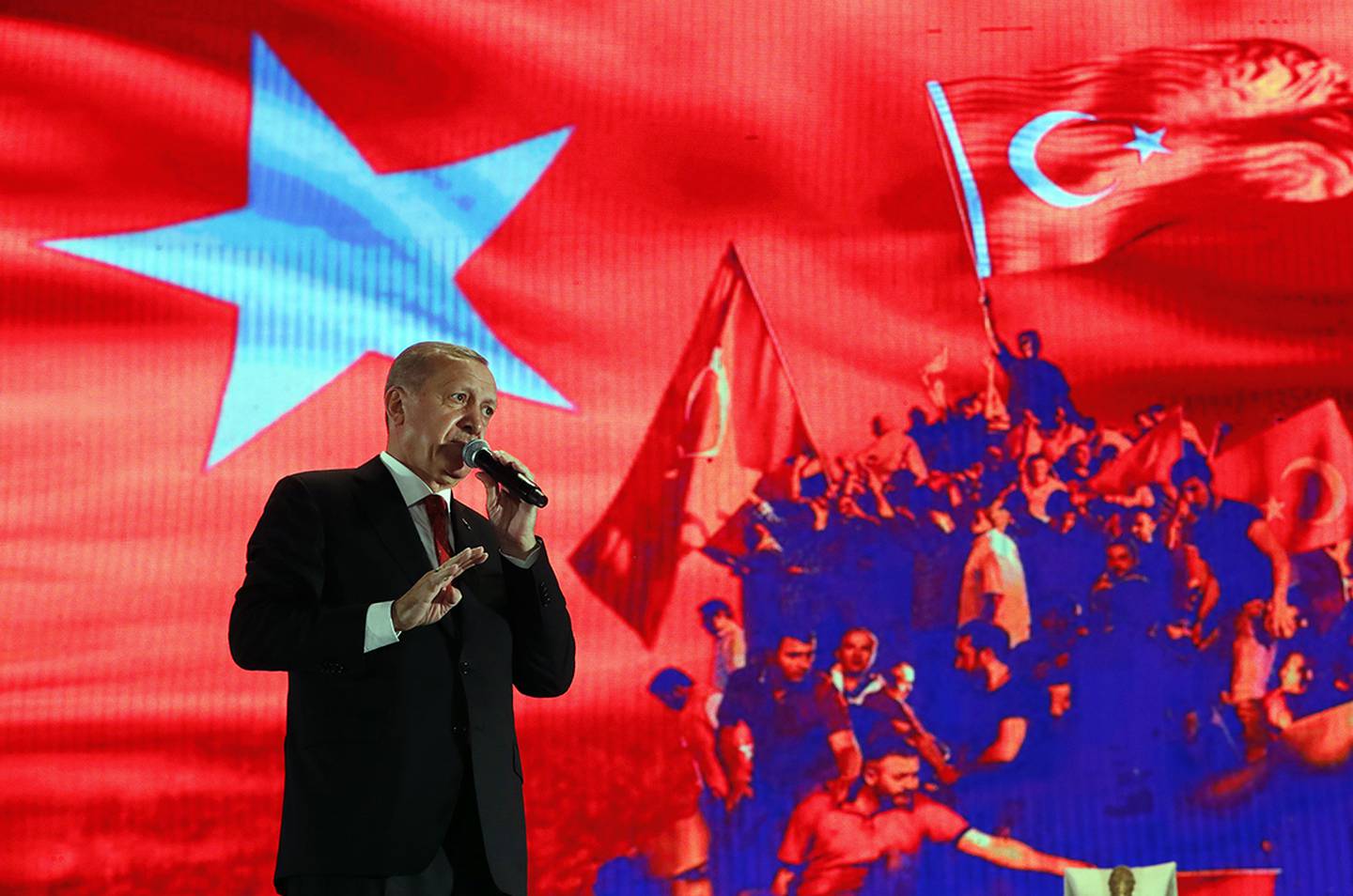 In this file photo dated July 15, 2019, Turkey's President Recep Tayyip Erdogan delivers a speech at a rally to honor the victims of the July 15, 2016, failed coup attempt, in Istanbul.