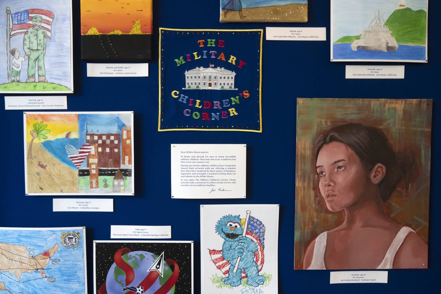 Artwork by military children decorates a display in the East Colonnade of the East Wing at the White House, Tuesday, Sept. 26, 2023, in Washington.