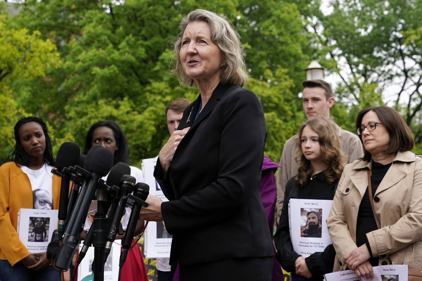 Elizabeth Whelan, sister of U.S. Marine Corps veteran and Russian prisoner Paul Whelan, speaks at a news conference alongside families of Americans currently being held hostage or wrongfully detained overseas in Lafayette Park near the White House, May 4, 2022, in Washington.